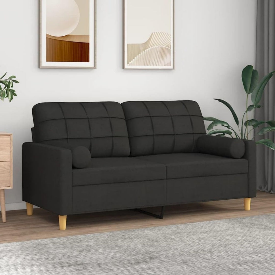 Armlehnen treffen auf ein Metallgestell an dem Sofa